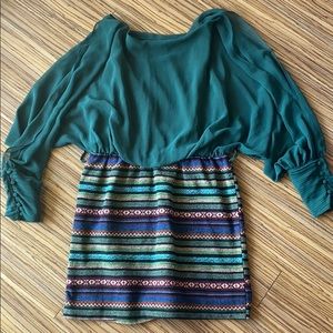 Cut out long sleeve dress with wool bottom.